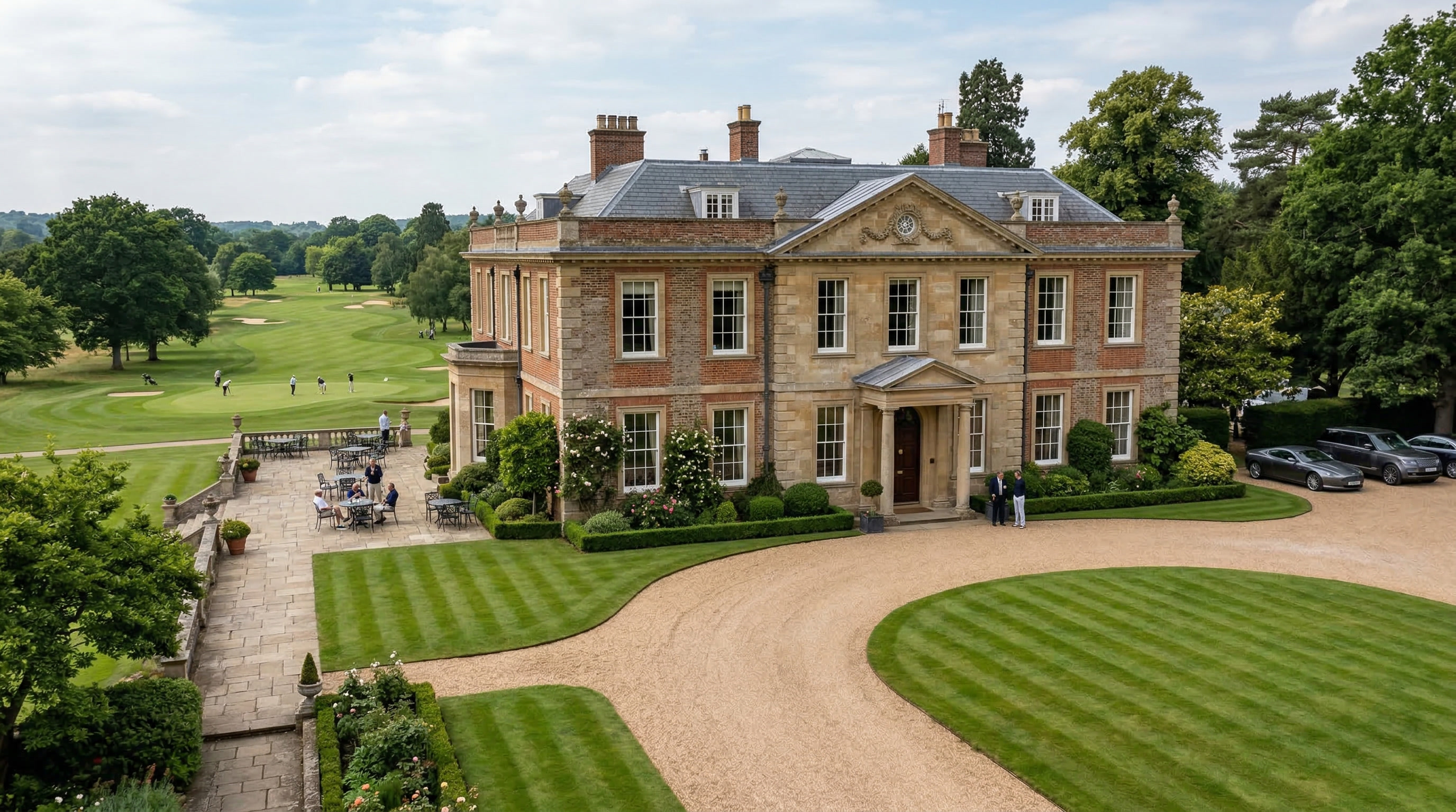 The grand clubhouse exterior overlooking the course